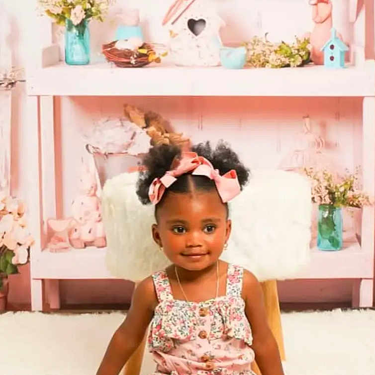 Kenzee is registered to the contest to win money with this photo: baby, babylaughing, blackhair, child, clothing, curlyhair, face, female, footwear, girl, hair, happy, head, person, shoe, sitting, sleeve, smile