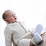 Léonn a rejoint le concours — aidez-le/la à gagner de superbes lots ! baby, bodypart, clothing, face, finger, footwear, glove, hand, head, hosiery, knitwear, newborn, person, photography, portrait, shoe, skin, sock, sweater, tattoo