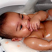 Kamden joined the competition — help win amazing prizes! baby, bath, bubble, foam, water, cushion, star_pattern, smile, hand, skin, infant, child, relaxation, cleaning, bathtub, wet, happy, cute, indoors, portrait
