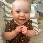 Zaylee is registered to the contest to win money with this photo: architecture, baby, babylaughing, building, couch, cushion, face, furniture, happy, head, homedecor, indoors, laughing, livingroom, person, photography, portrait, room, sitting, smile