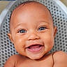 Carmella joined the competition — help win amazing prizes! baby, infant, child, smiling, happy, portrait, close_up, face, eyes, open_mouth, chubby_cheeks, bare_shoulders, skin, lying_down, indoors, patterned_background, photography, adorable, joyful, headshot