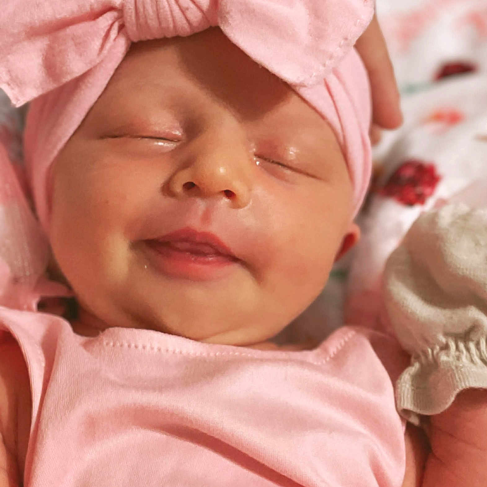 Revvlynn joined the competition — help win amazing prizes! baby, infant, sleeping, pink_bow, headband, pink_clothing, closeup, face, peaceful, cute, soft_light, newborn, hand, blanket, portrait, adorable, skin, baby_girl, resting, cozy