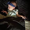 Revvlynn is registered to the contest to win money with this photo: baby, sleeping, headband, blanket, floral_dress, infant, hand, face, peaceful, cozy, bed, textured_background, portrait, young_child, indoors, resting, cute, soft_lighting, sleep, toddler