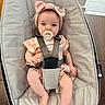 Brooke joined the competition — help win amazing prizes! baby, infant, pacifier, headband, pink, straps, baby_rocker, seat, clothing, child, person, indoor, floor, wood_floor, cute, looking, sitting, baby_girl, soft_fabric, comfort