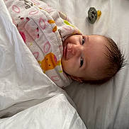 Brooke joined the competition — help win amazing prizes! baby, blanket, bed, pacifier, smile, infant, face, child, cute, cozy, soft, toy, lying_down, happy, indoors, sleepwear, newborn, comfort, head, wrapped