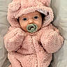 baby, pacifier, pink, onesie, hood, ears, fluffy, cute, infant, child, soft, warm, portrait, indoor, closeup, face, clothing, babywear, newborn, adorable