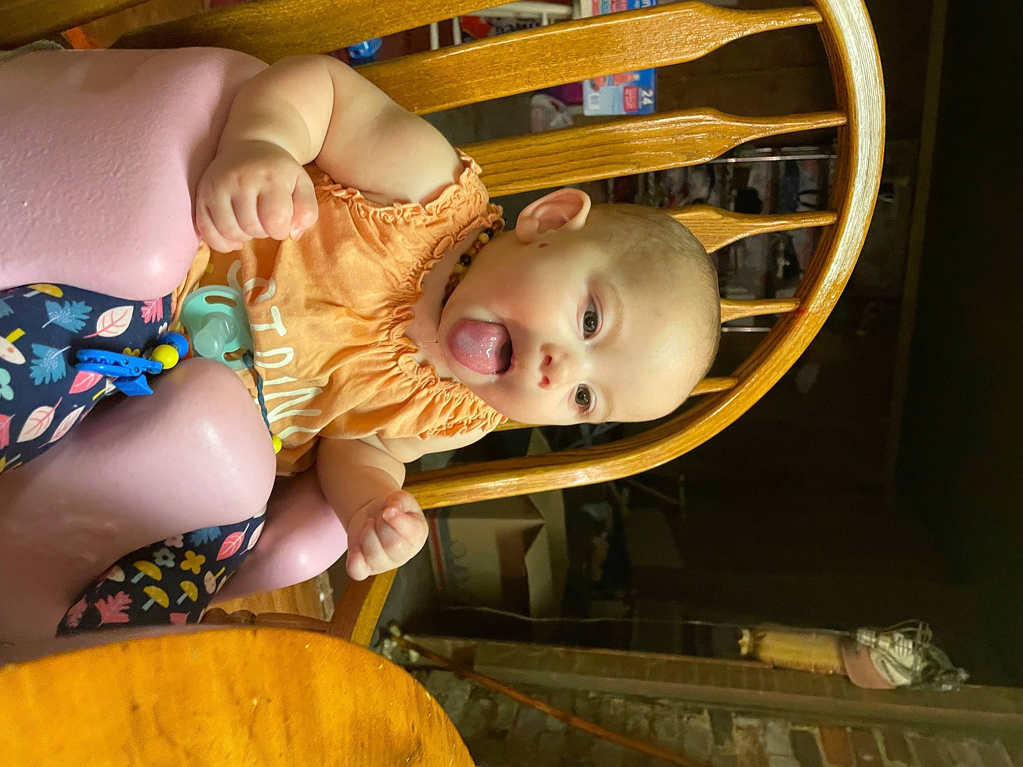 Helen is registered to the contest to win money with this photo: baby, baby_products, baby_toddler_clothing, cheek, child, comfort, eye, facial_expression, finger, fun, happy, head, human_body, iris, mouth, person, skin, smile, toddler, wood