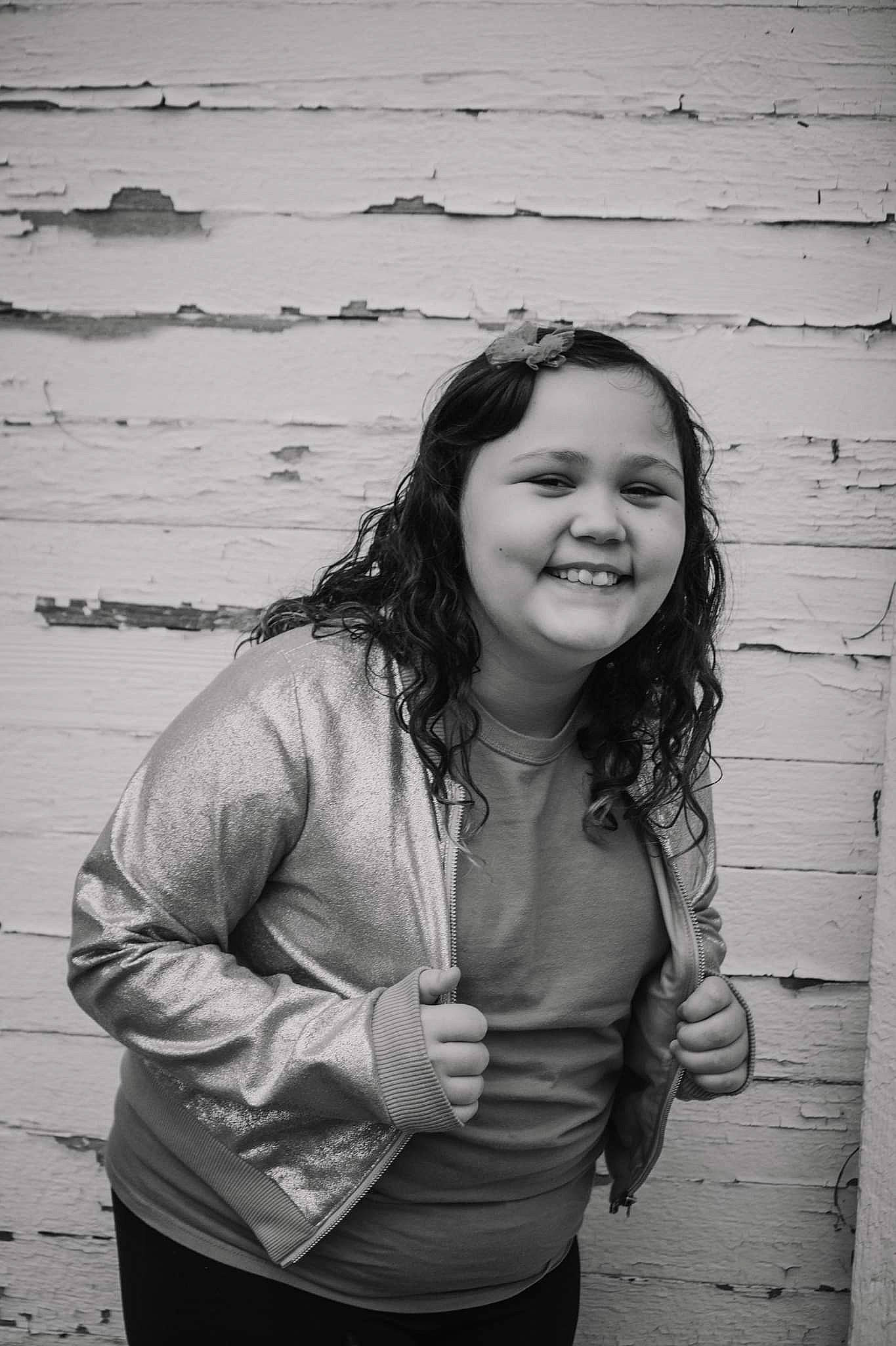 Emma joined the competition — help win amazing prizes! black, black_and_white, eye, facial_expression, flash_photography, fun, gesture, grass, happy, joy, monochrome, monochrome_photography, organ, people, person, photograph, sleeve, smile, standing, style