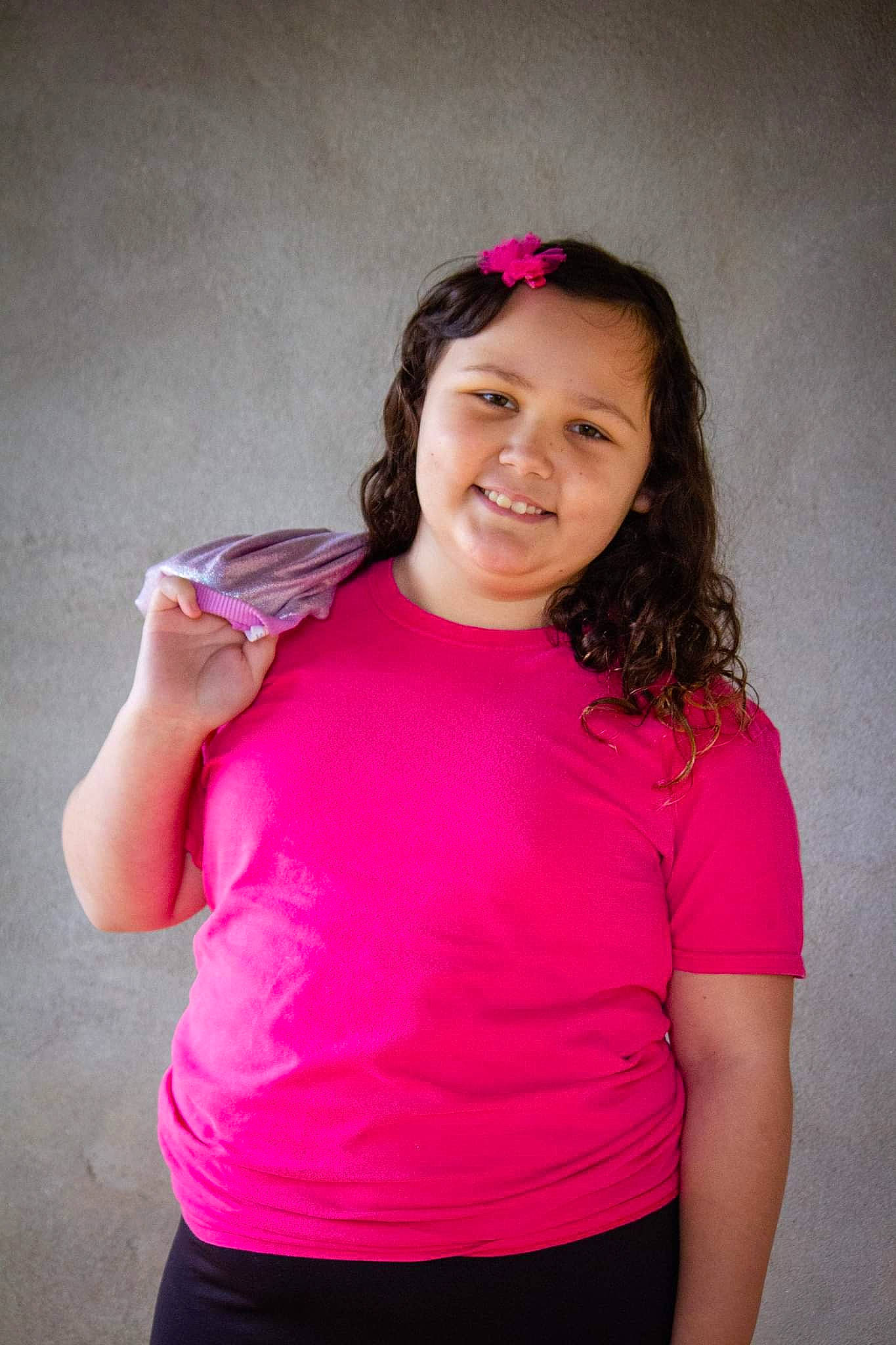 Emma joined the competition — help win amazing prizes! arm, clothing, cool, elbow, eyelash, face, flash_photography, gesture, happy, head, human_body, joint, joy, lip, person, pink, shoulder, skin, sleeve, smile