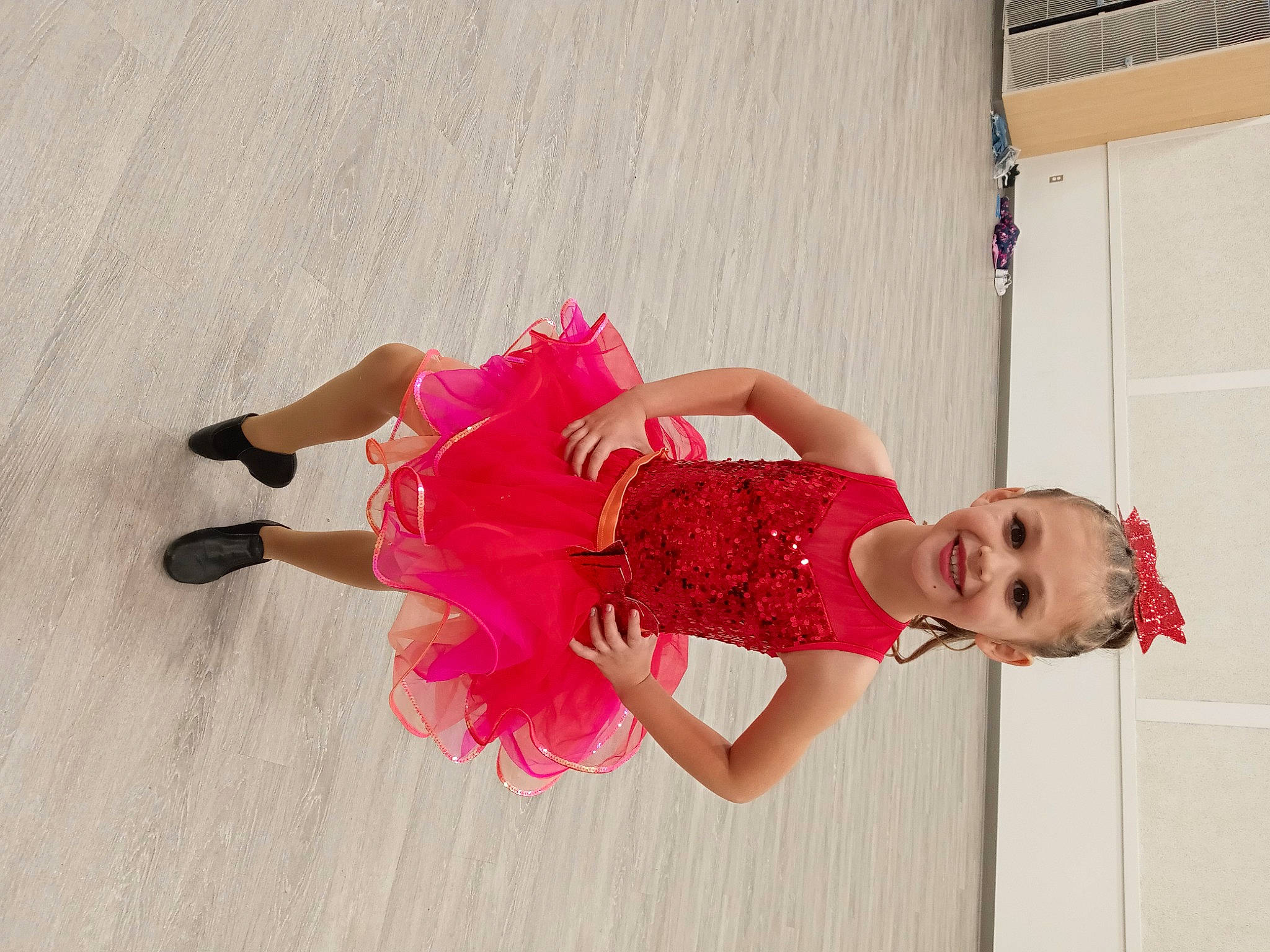 Kwynn joined the competition — help win amazing prizes! baby_toddler_clothing, child, costume, entertainment, event, fashion_design, flooring, fun, happy, human_leg, joy, leisure, magenta, pattern, performing_arts, person, pink, sandal, smile, thigh