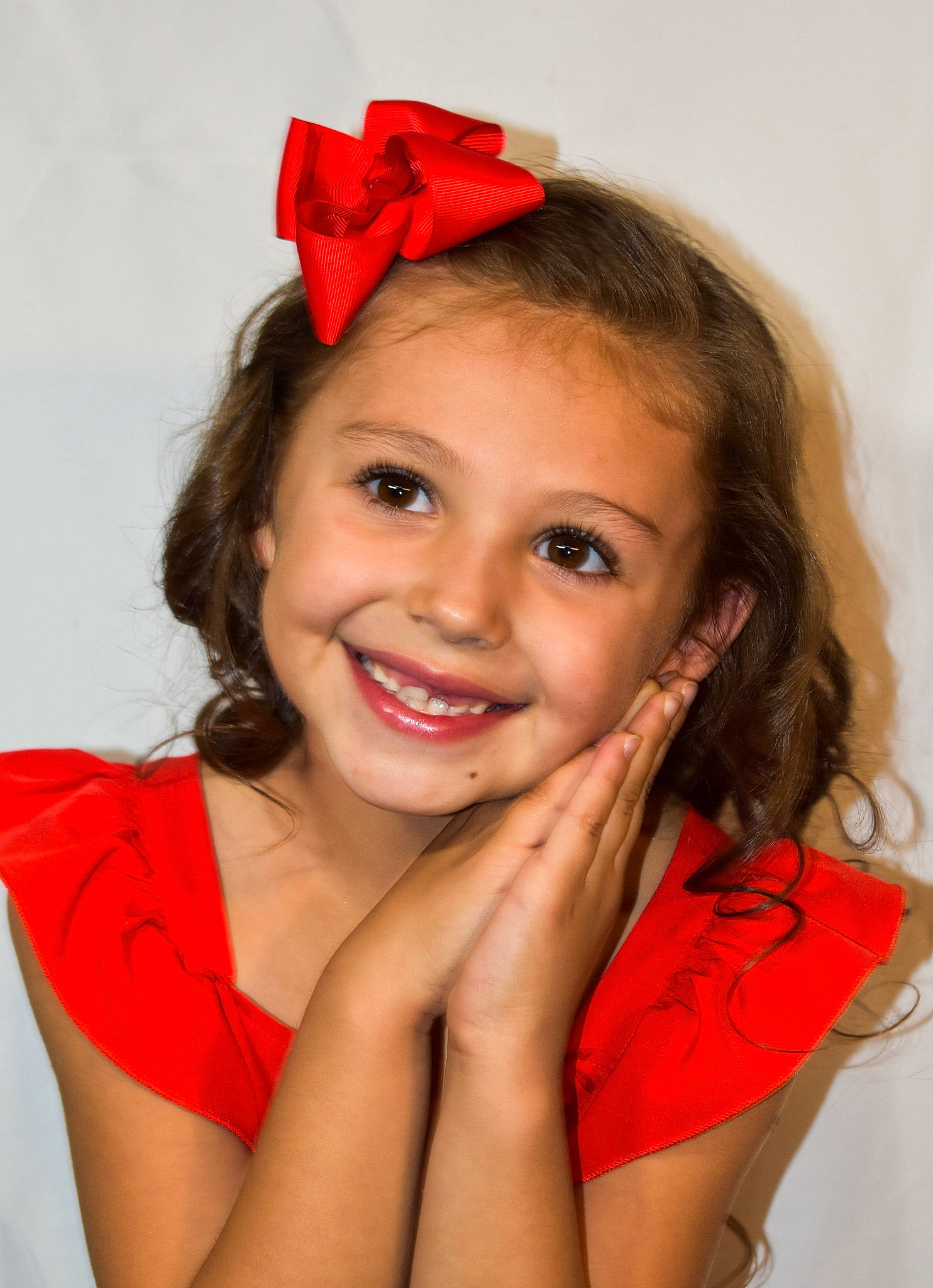 Kwynn is registered to the contest to win money with this photo: black_hair, brown_hair, child, chin, eyebrow, eyelash, fashion_accessory, flash_photography, fun, gesture, happy, hat, headpiece, joy, lip, lipstick, long_hair, magenta, neck, person