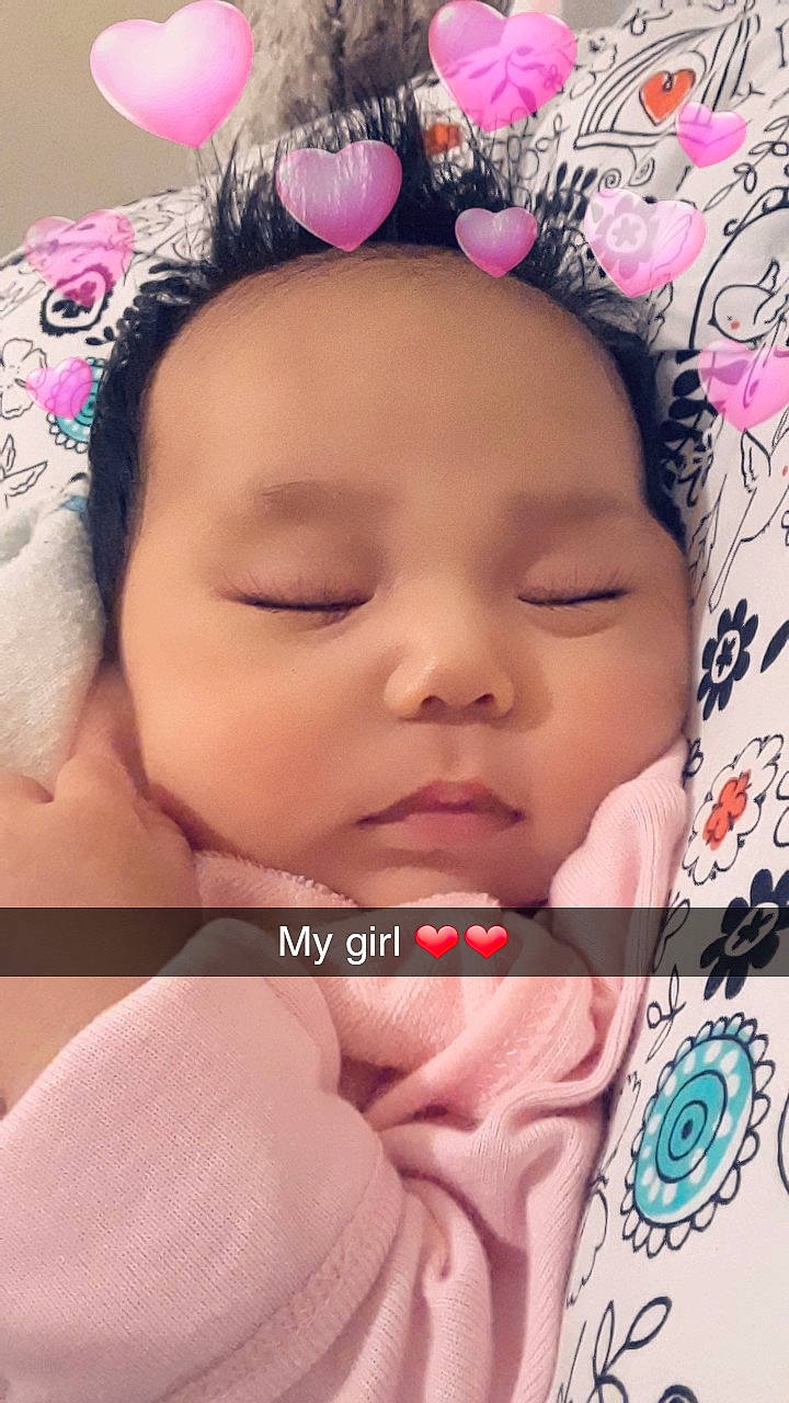 Rachael Johnson is registered to the contest to win money with this photo: baby, beauty, cheek, child, chin, close_up, eye, eyebrow, eyelash, face, forehead, hair_accessory, head, lip, mouth, nose, person, photography, pink, skin