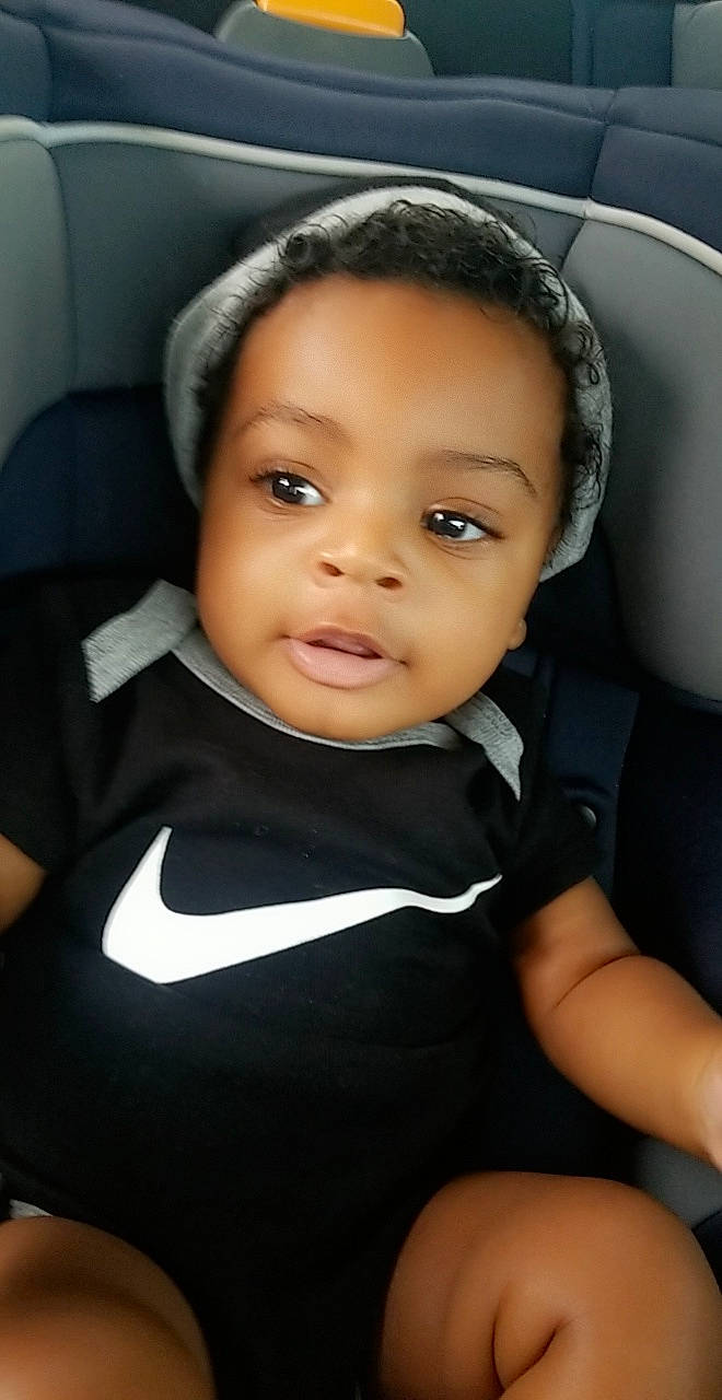 Se'Maj joined the competition — help win amazing prizes! auto_part, automotive_design, black_hair, car_seat, cheek, child, comfort, dress, eye, face, flash_photography, fun, head_restraint, lip, nose, person, skin, smile, t_shirt, toddler