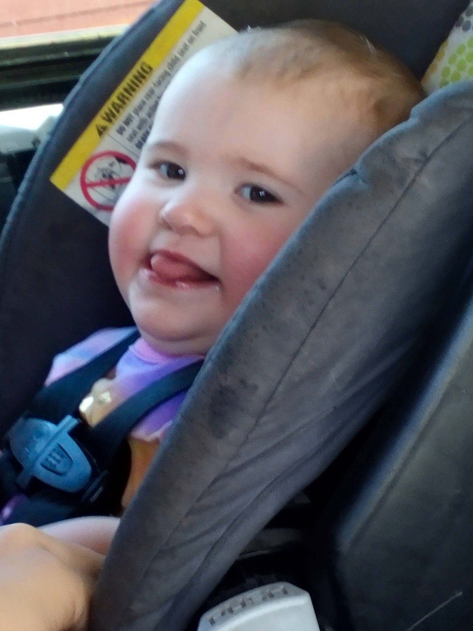 Serenity is registered to the contest to win money with this photo: auto_part, baby, baby_carriage, baby_in_car_seat, baby_products, car_seat, car_seat_cover, child, comfort, electric_blue, family_car, head_restraint, joy, motor_vehicle, person, seat_belt, smile, steering_wheel, toddler, vehicle