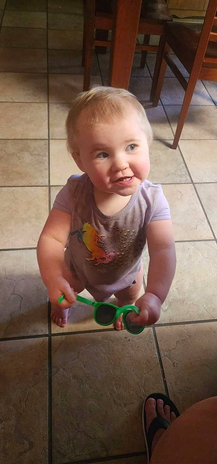 Serenity joined the competition — help win amazing prizes! arm, baby, baby_toddler_clothing, child, eye, finger, floor, flooring, foot, fun, hand, hardwood, human_leg, nail, person, sitting, skin, smile, thumb, toddler