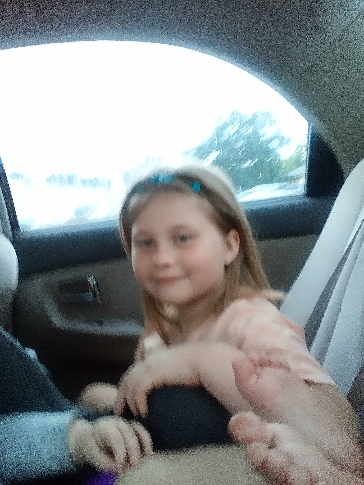 Tessa is registered to the contest to win money with this photo: automotive_design, automotive_exterior, automotive_mirror, car, car_seat, car_seat_cover, comfort, finger, gesture, hand, head_restraint, joy, motor_vehicle, person, smile, steering_part, steering_wheel, toddler, vehicle, vehicle_door