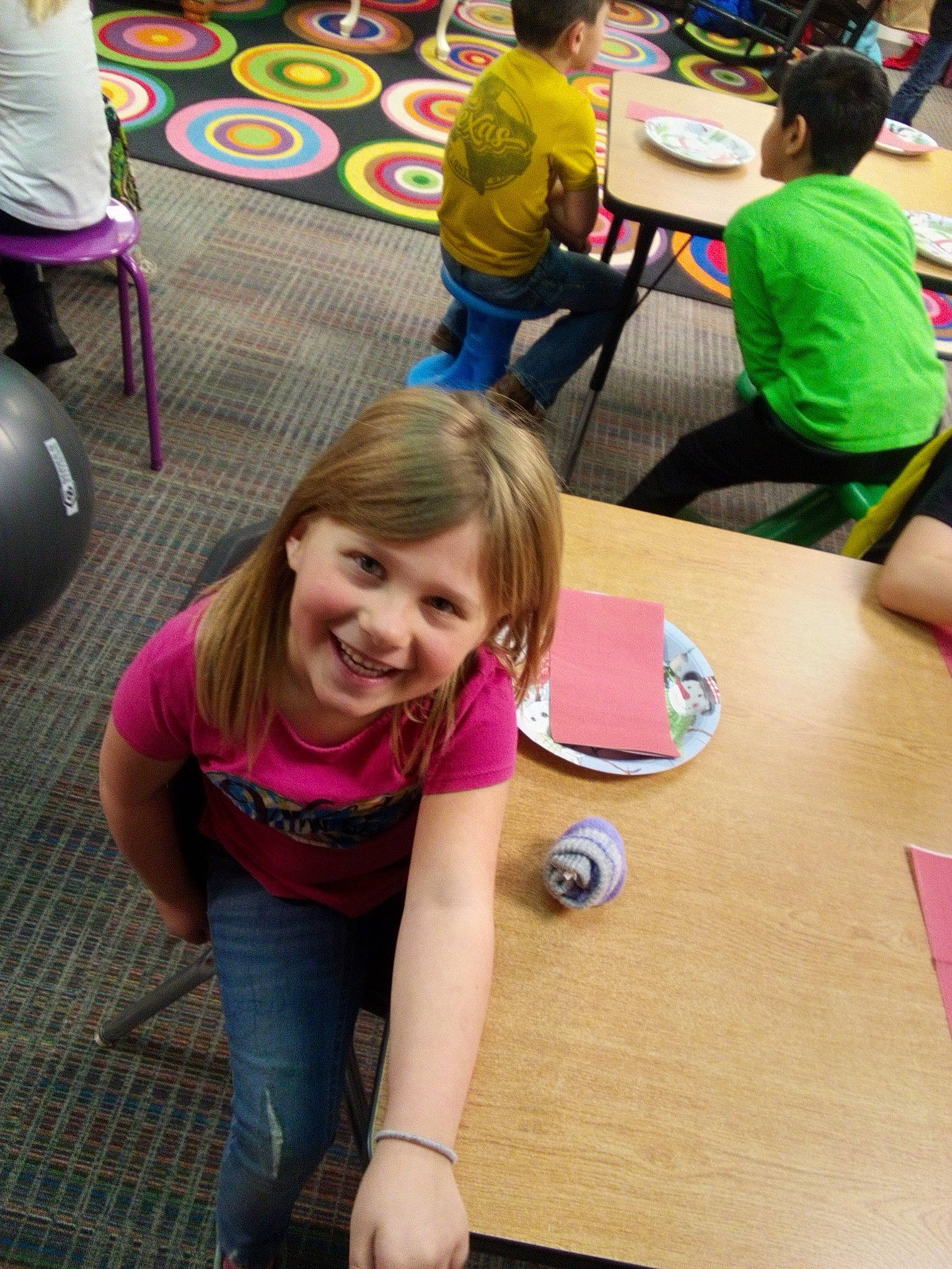 Tessa joined the competition — help win amazing prizes! chair, child, clothing, desk, event, fun, furniture, happy, human_leg, joy, leisure, person, recreation, sharing, sitting, smile, social_group, summer, t_shirt, table