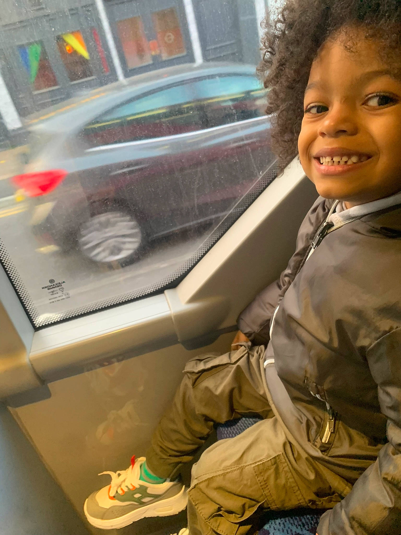 Micah joined the competition — help win amazing prizes! auto_part, automotive_design, automotive_exterior, automotive_lighting, automotive_window_part, car, cool, eye, face, family_car, gesture, hairstyle, joy, motor_vehicle, person, personal_luxury_car, smile, toddler, vehicle, vehicle_door