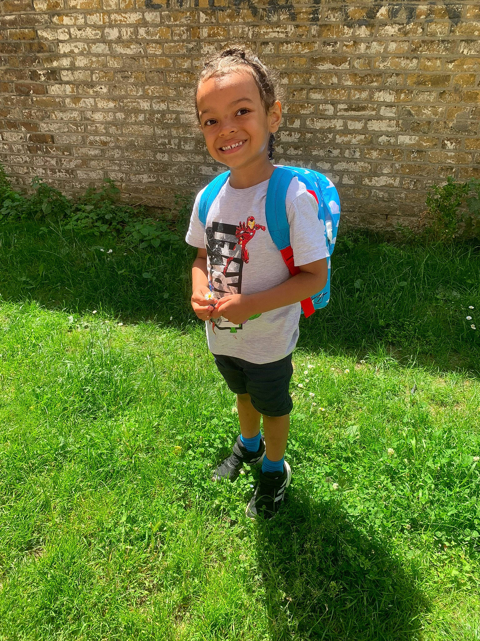 Micah joined the competition — help win amazing prizes! child, electric_blue, fun, garden, grass, grass_family, grassland, groundcover, happy, joy, leisure, people_in_nature, person, plant, recreation, shorts, smile, sneakers, soil, t_shirt