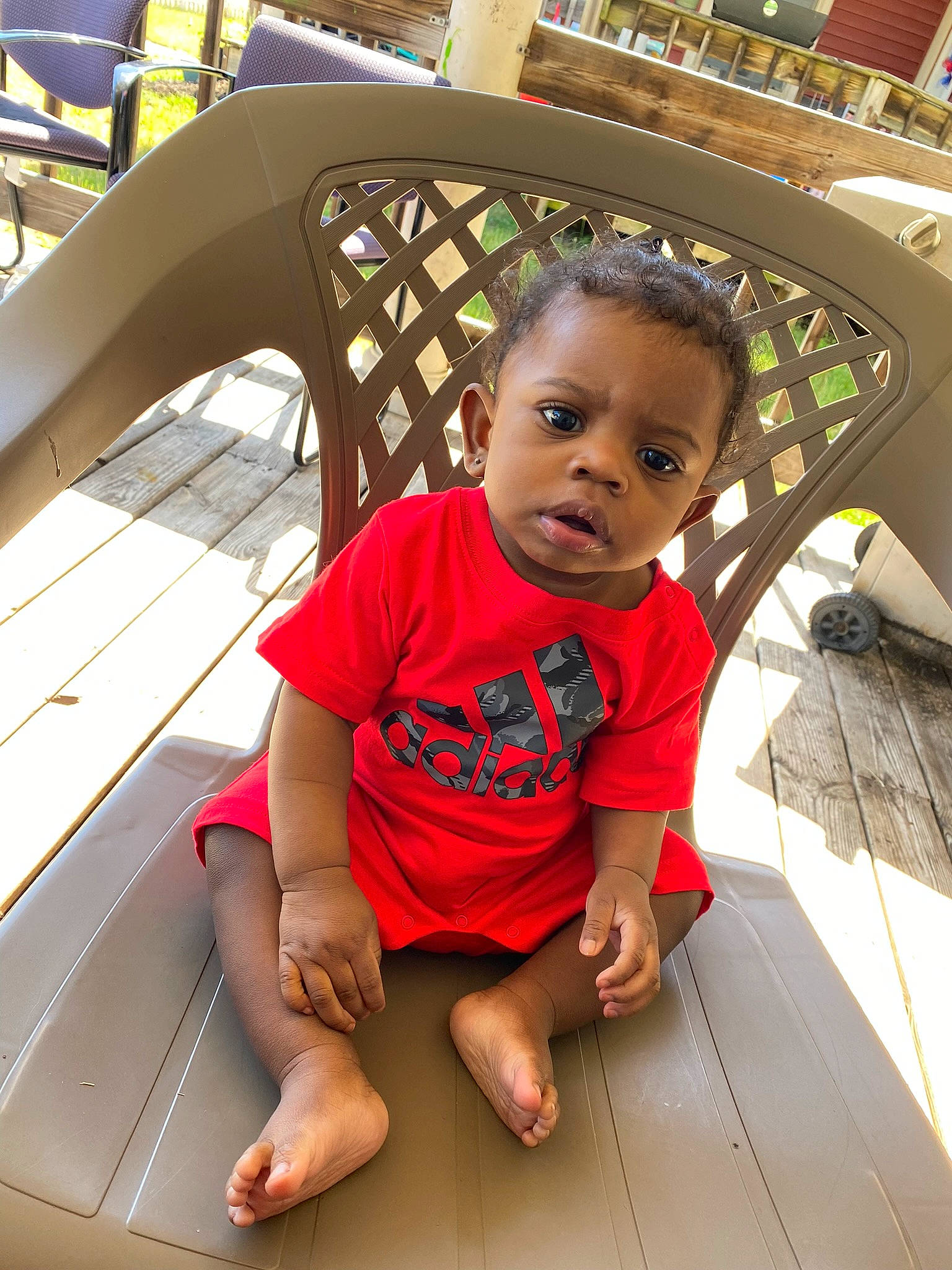 Khysen joined the competition — help win amazing prizes! baby, baby_toddler_clothing, barefoot, chair, child, eyewear, flooring, foot, fun, grass, happy, hardwood, leisure, person, sandal, sitting, skin, thigh, toddler, vacation