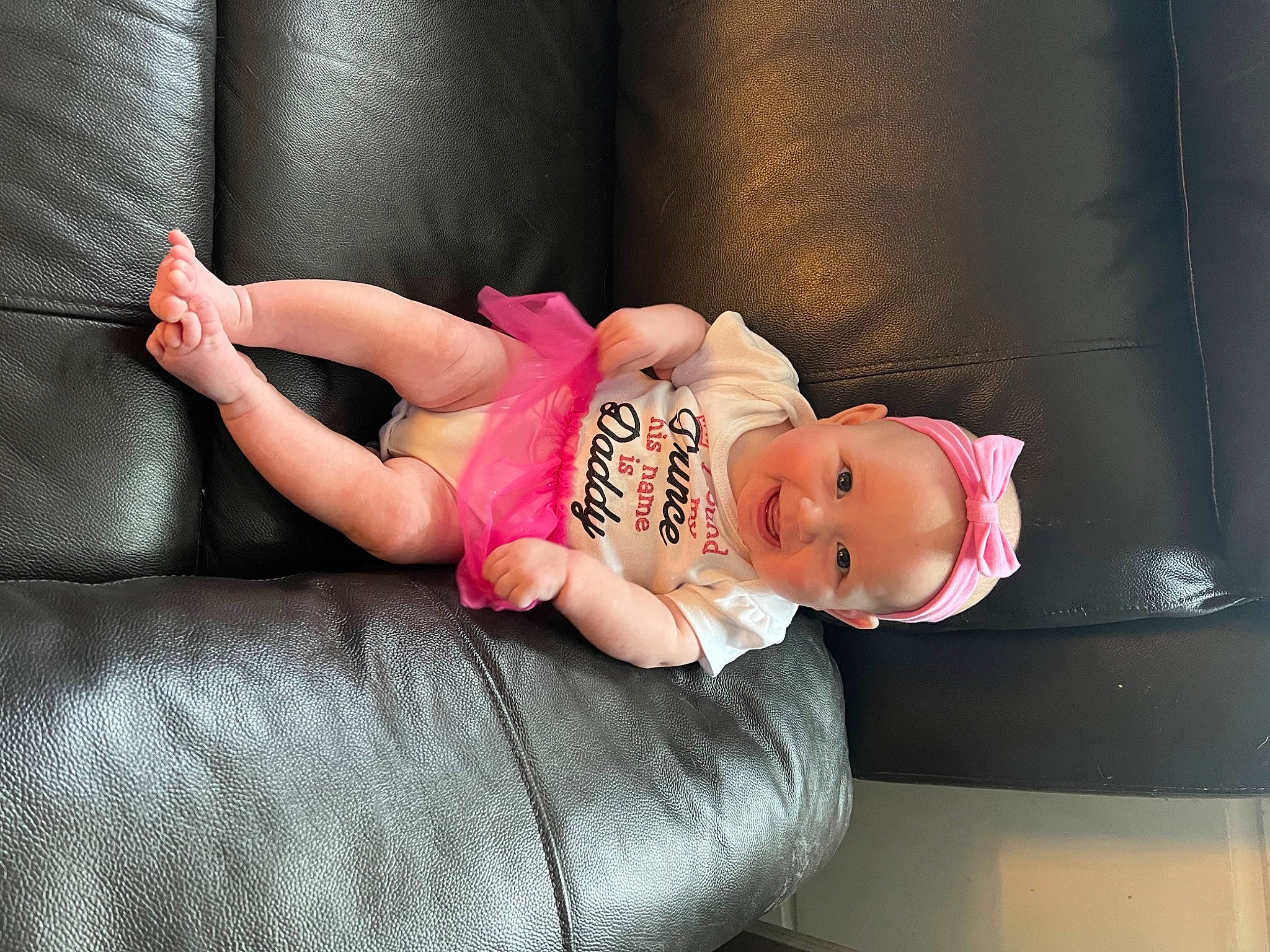 Juliana joined the competition — help win amazing prizes! baby, baby_toddler_clothing, child, comfort, couch, finger, flash_photography, foot, human_body, human_leg, joy, knee, leg, person, pink, room, sitting, skin, textile, thigh