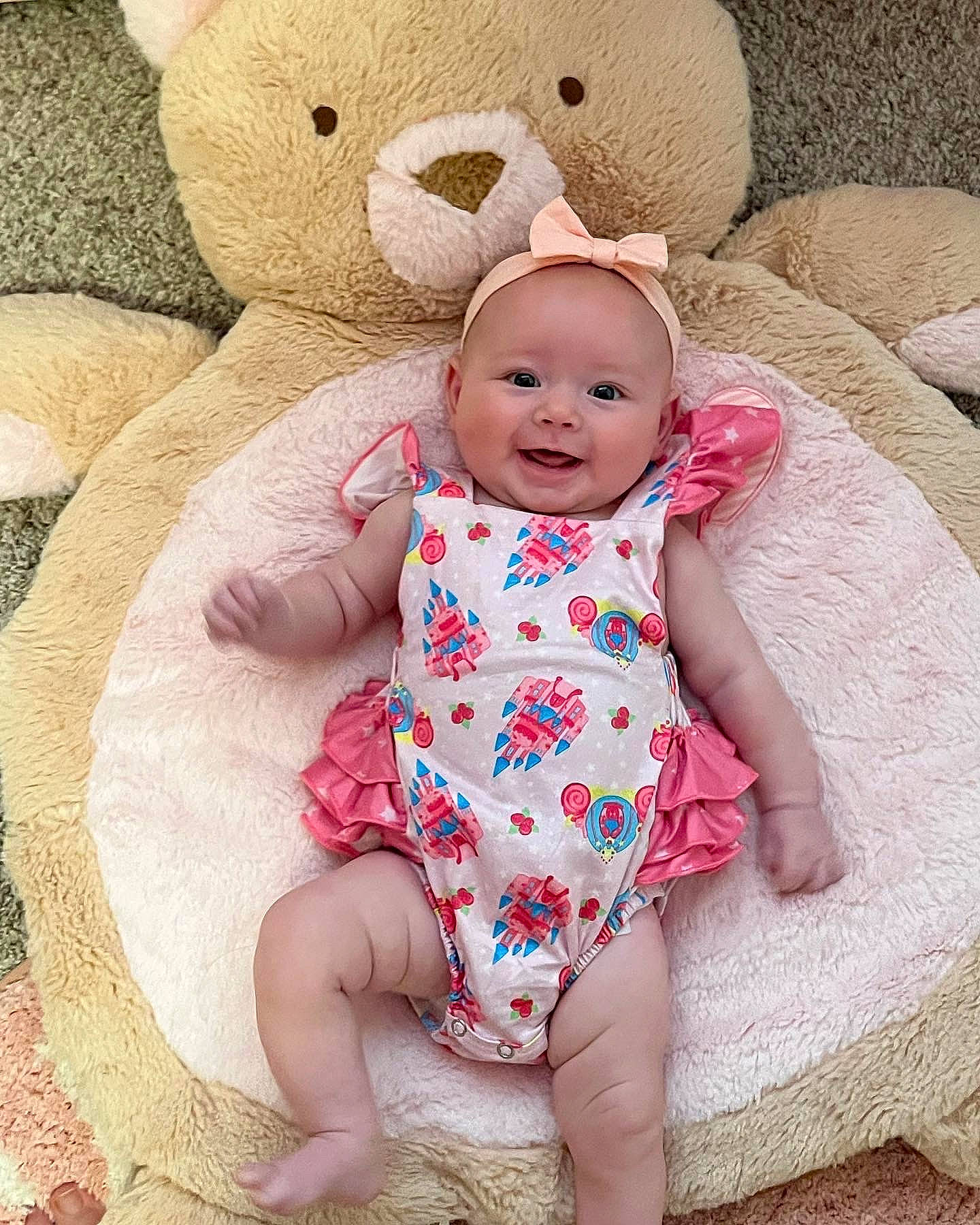 Juliana is registered to the contest to win money with this photo: baby, baby_toddler_clothing, cheek, child, comfort, eye, face, facial_expression, green, happy, head, headgear, joy, linens, person, pink, skin, sleeve, smile, textile