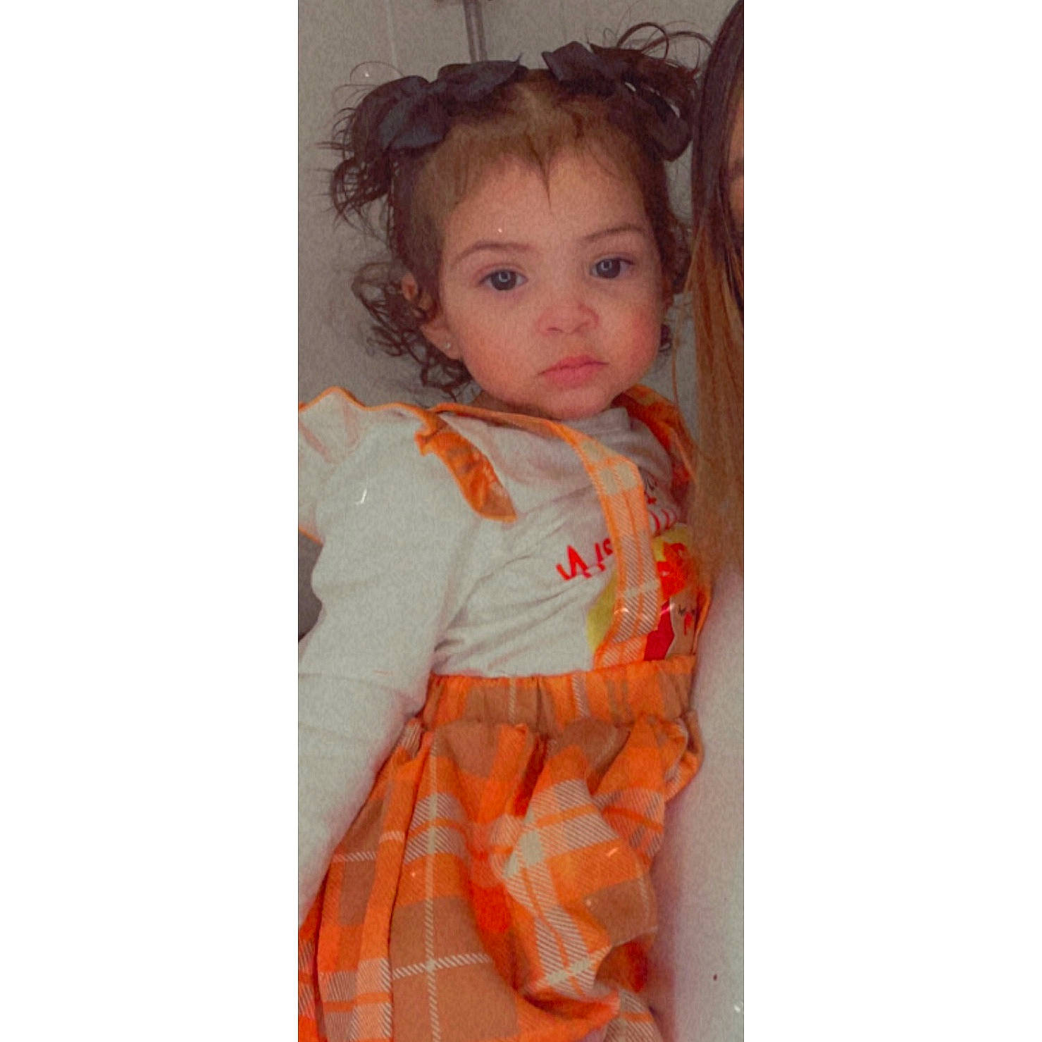 Renessme joined the competition — help win amazing prizes! baby, baby_toddler_clothing, collar, day_dress, dress, dress_shirt, eye, eyelash, fashion_design, hair, head, human_body, iris, lip, long_hair, neck, person, sleeve, tartan, toddler