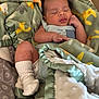 baby, sleeping, blanket, sock, infant, cozy, cute, soft, wrapped, child, resting, peaceful, indoors, fabric, comfort, newborn, pajamas, cute_face, nap, warm