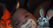 Phoenix joined the competition — help win amazing prizes! baby, pacifier, animated_characters, nick_wilde, judy_hopps, zootopia, disney_plus, streaming, couch, child, cartoon, digital_overlay, indoor, holding, clothing, infant, portrait, screen_text, animation, character