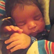 Phoenix is registered to the contest to win money with this photo: baby, sleeping, blanket, closeup, hands, infant, cozy, child, face, peaceful, soft, warm, striped_blanket, resting, portrait, indoors, cute, newborn, toddler, comfort