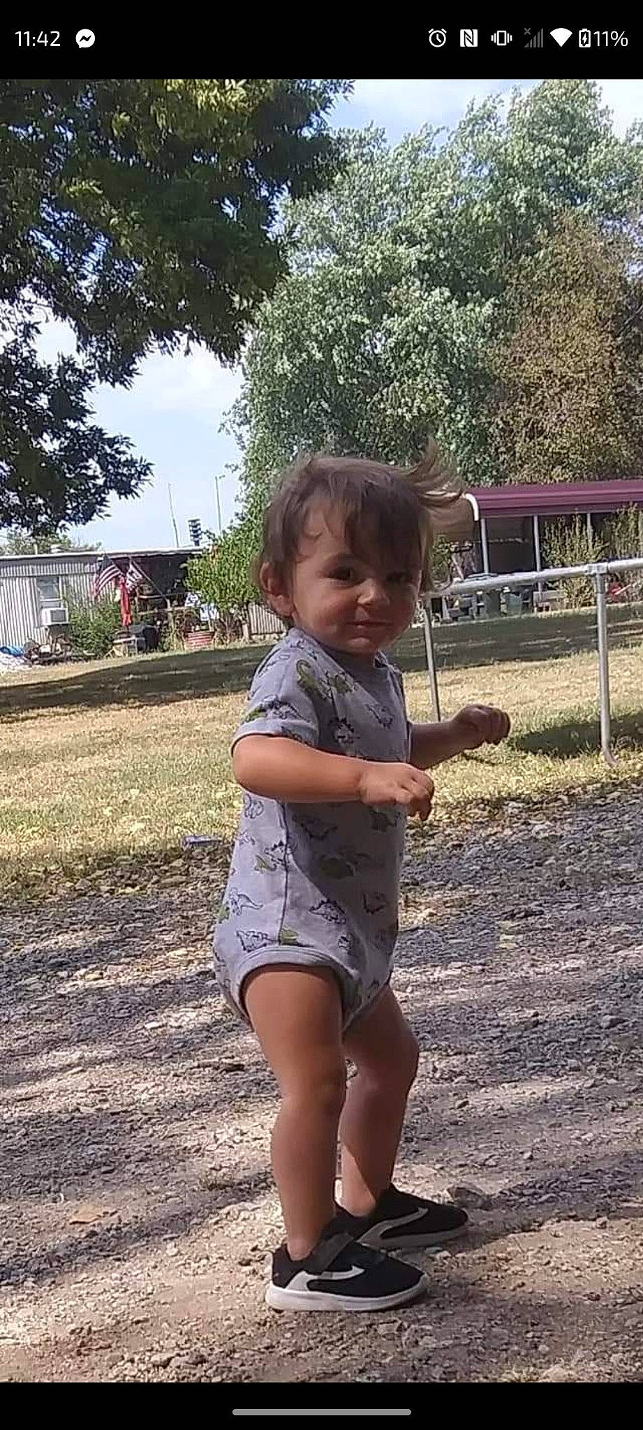 Kylar joined the competition — help win amazing prizes! asphalt, barefoot, child, city, fun, grass, happy, human_leg, leg, leisure, person, plant, sky, sleeve, smile, soil, t_shirt, thigh, toddler, tree