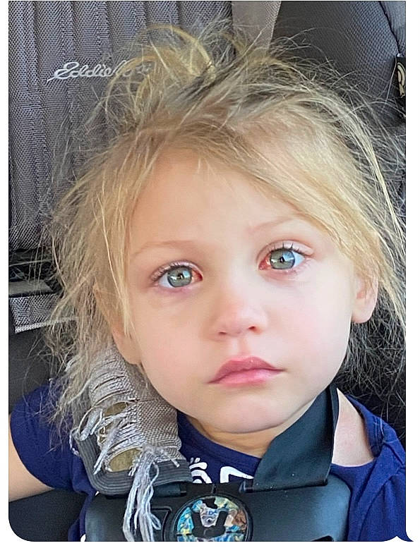 Reba is registered to the contest to win money with this photo: beauty, blond, cheek, child, chin, electric_blue, eyebrow, eyelash, face, iris, jaw, lip, long_hair, nose, outerwear, person, rectangle, street_fashion, surfer_hair, toddler