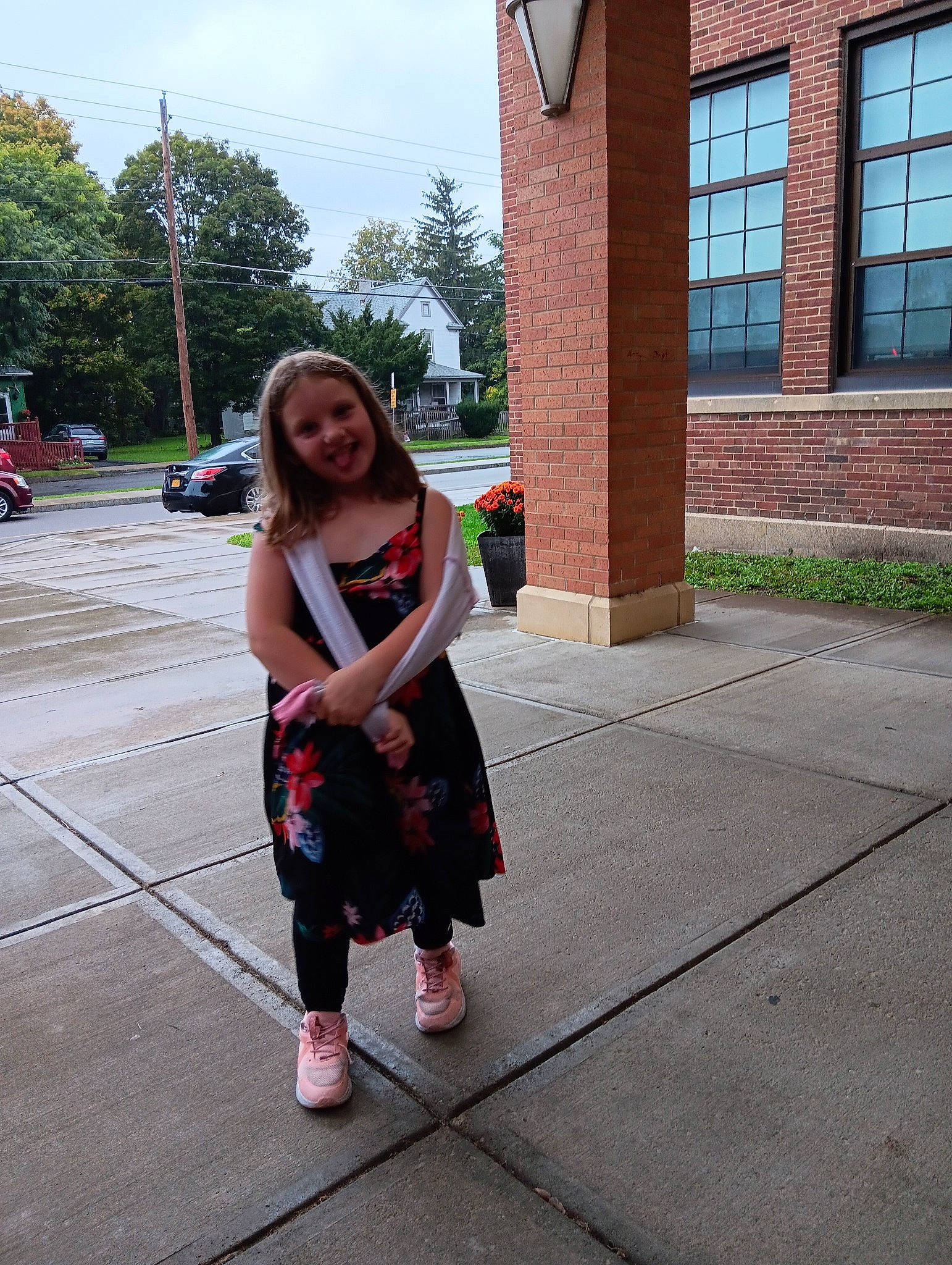 Skylar joined the competition — help win amazing prizes! asphalt, car, fun, human_leg, joy, leisure, luggage_and_bags, magenta, person, pink, road, road_surface, sidewalk, sky, smile, standing, tire, travel, tree, waist