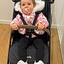 Lou participe au concours pour gagner de l'argent avec cette photo : baby, bumper_bar, clothing, cute, eyes, fur_hood, hands, harness, indoor, pacifier, pink_jacket, playful, portrait, pram, seat, shoes, sneakers, stroller, toddler, wooden_floor
