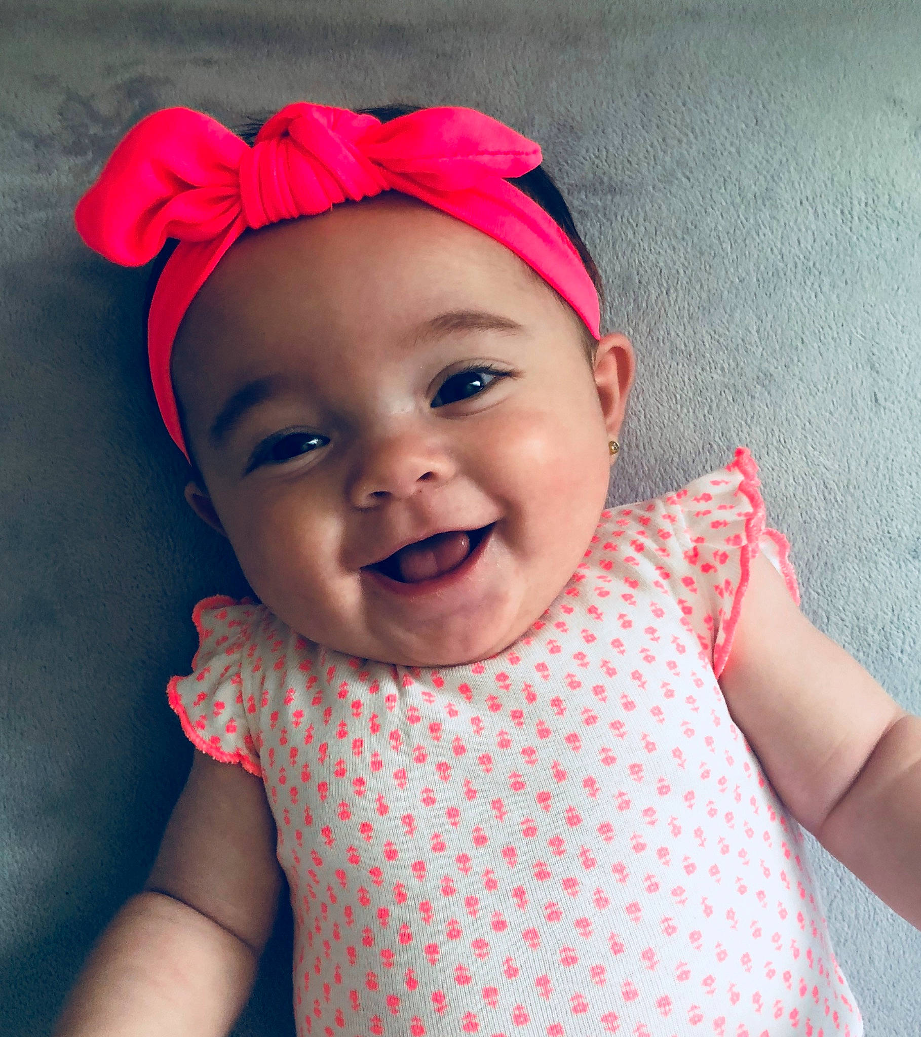 Peighton joined the competition — help win amazing prizes! bonnet, cap, cheek, child, eye, facial_expression, fashion_accessory, girl, hair_accessory, happiness, head, headband, headgear, infant, joy, lip, person, pink, red, skin