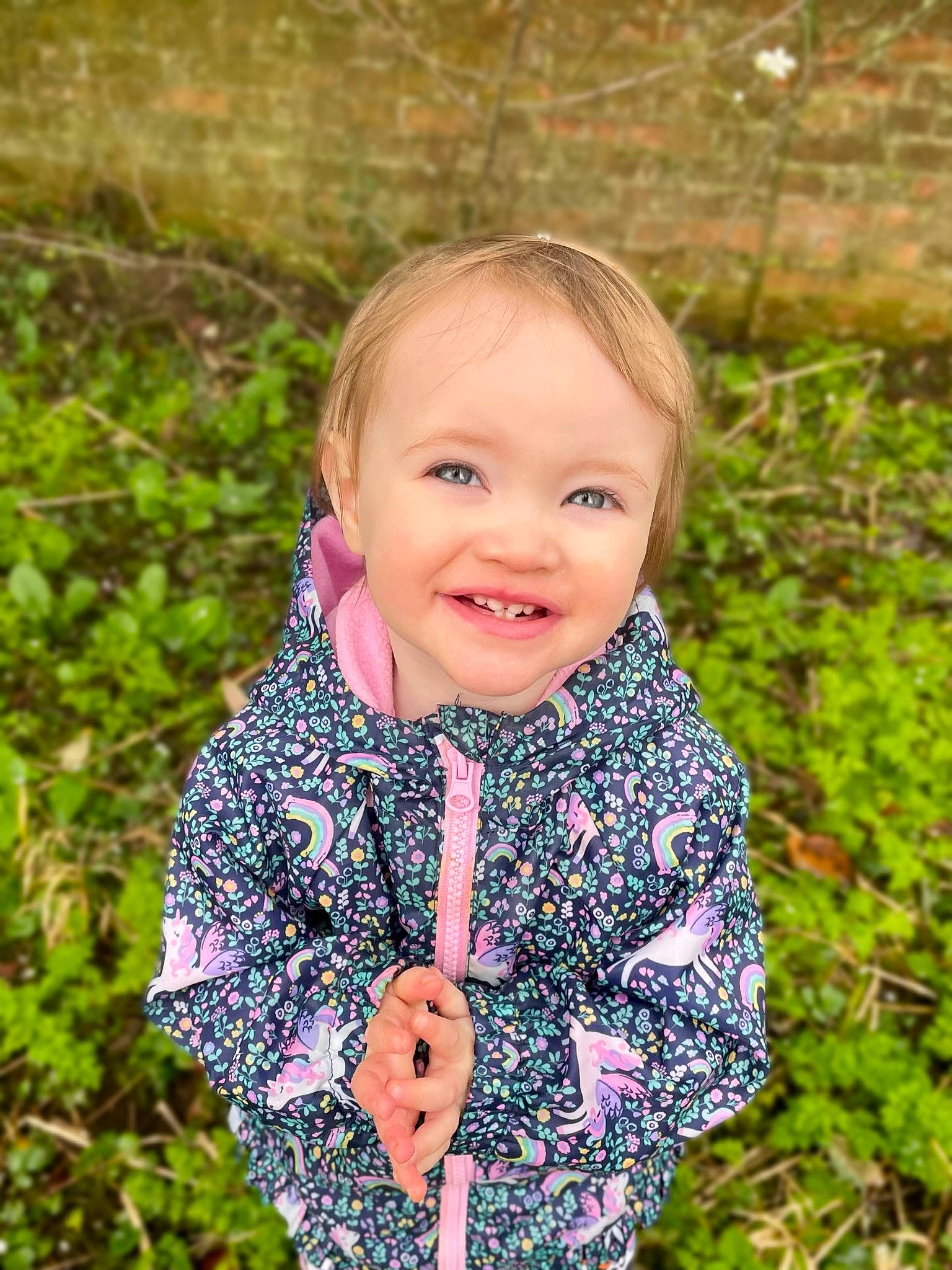 Eloise joined the competition — help win amazing prizes! baby, baby_toddler_clothing, child, electric_blue, face, facial_expression, grass, grassland, happy, head, iris, joy, outerwear, pattern, people_in_nature, person, plant, sleeve, smile, spring