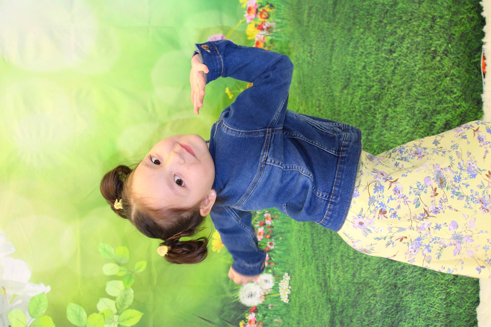 Kenzlie is registered to the contest to win money with this photo: arm, baby, child, denim, fun, grass, grassland, hand, happy, joy, leaf, leisure, pattern, people_in_nature, person, plant, play, recreation, sitting, smile