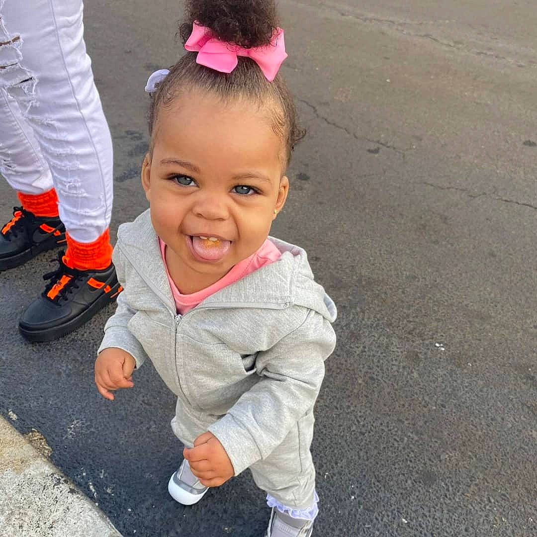 Ta'Leah joined the competition — help win amazing prizes! asphalt, baby_toddler_clothing, cool, eye, footwear, gesture, grass, hair, hairstyle, happy, head, person, photograph, road_surface, shoe, sleeve, smile, snapshot, sneakers, toddler