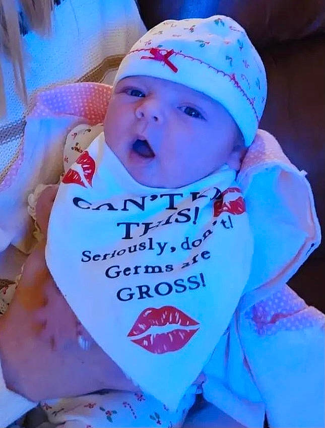 Lucy joined the competition — help win amazing prizes! baby, baby_products, baby_toddler_clothing, baseball_cap, bib, blue, cap, cheek, child, electric_blue, event, font, fun, happy, hat, headwear, person, pink, toddler