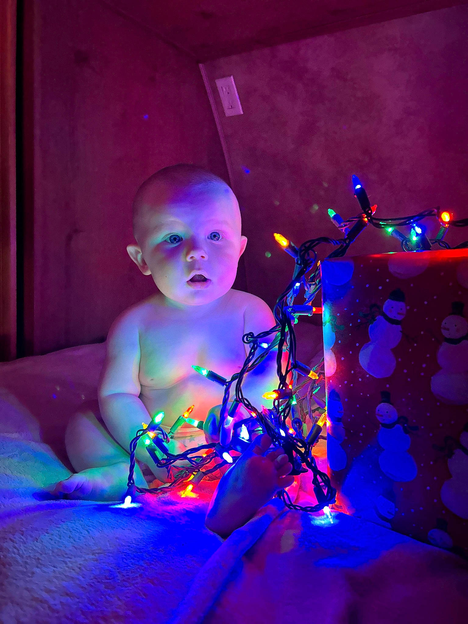 Kenneth joined the competition — help win amazing prizes! art, artist, baby, darkness, electric_blue, electronic_device, entertainment, event, fun, magenta, neon, performance_art, performing_arts, person, purple, room, sitting, space, toddler, violet
