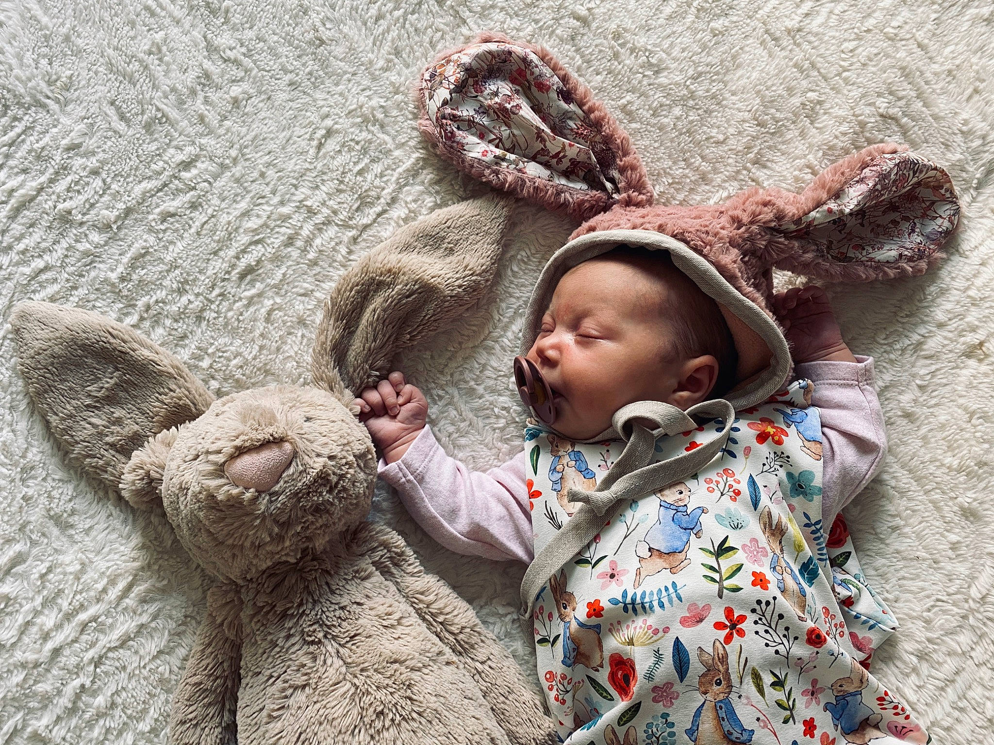 Delilah joined the competition — help win amazing prizes! baby, bonnet, child, ear, fur, happy, headgear, hood, knit_cap, outerwear, person, play, sleeve, smile, toddler, wool