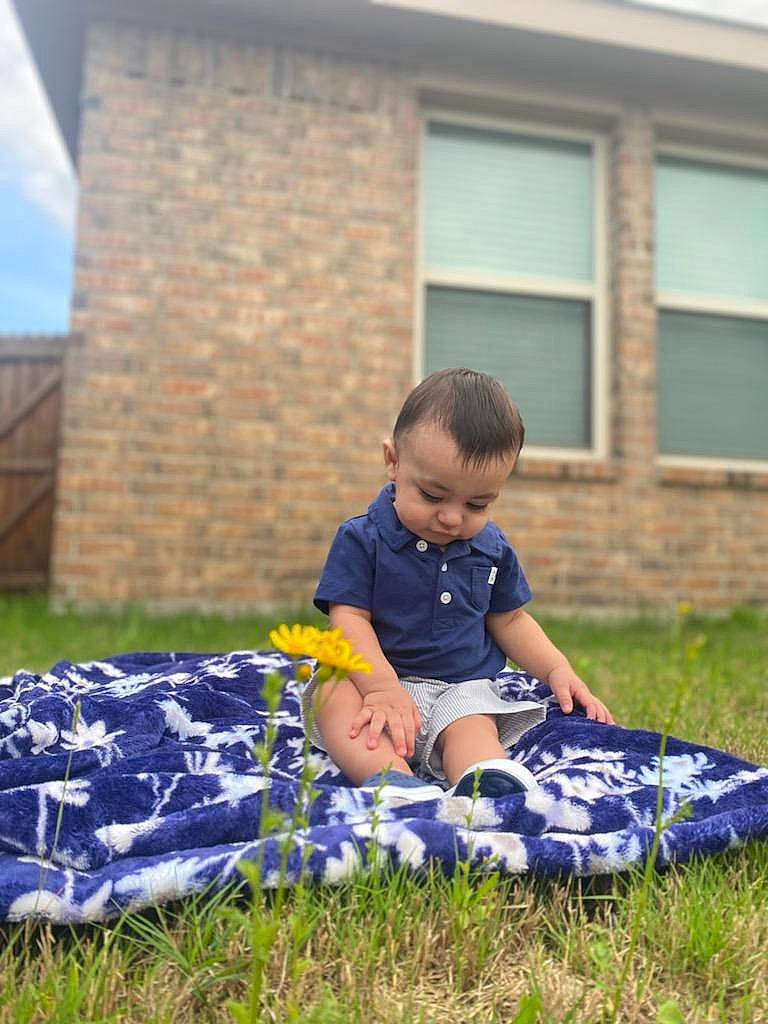 Christian joined the competition — help win amazing prizes! child, electric_blue, fun, grass, grass_family, grassland, happy, house, lawn, leisure, meadow, people_in_nature, person, plant, play, recreation, sitting, soil, t_shirt, toddler