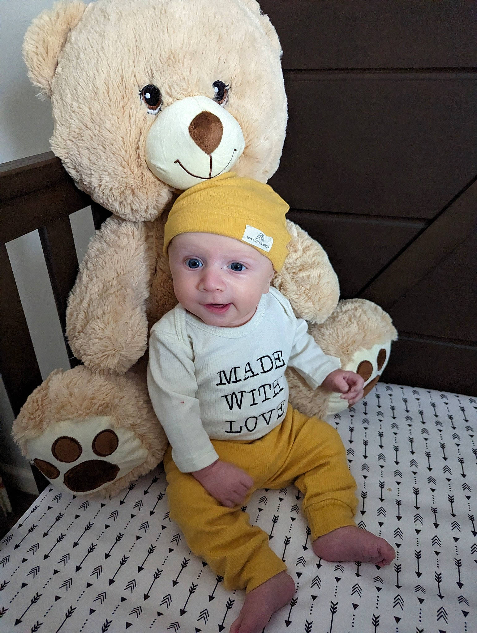 Holden joined the competition — help win amazing prizes! baby, baby_toddler_clothing, baby_toys, ball, bear, child, comfort, flooring, football, fur, happy, head, headwear, person, plush, room, stuffed_toy, teddy_bear, textile, toddler