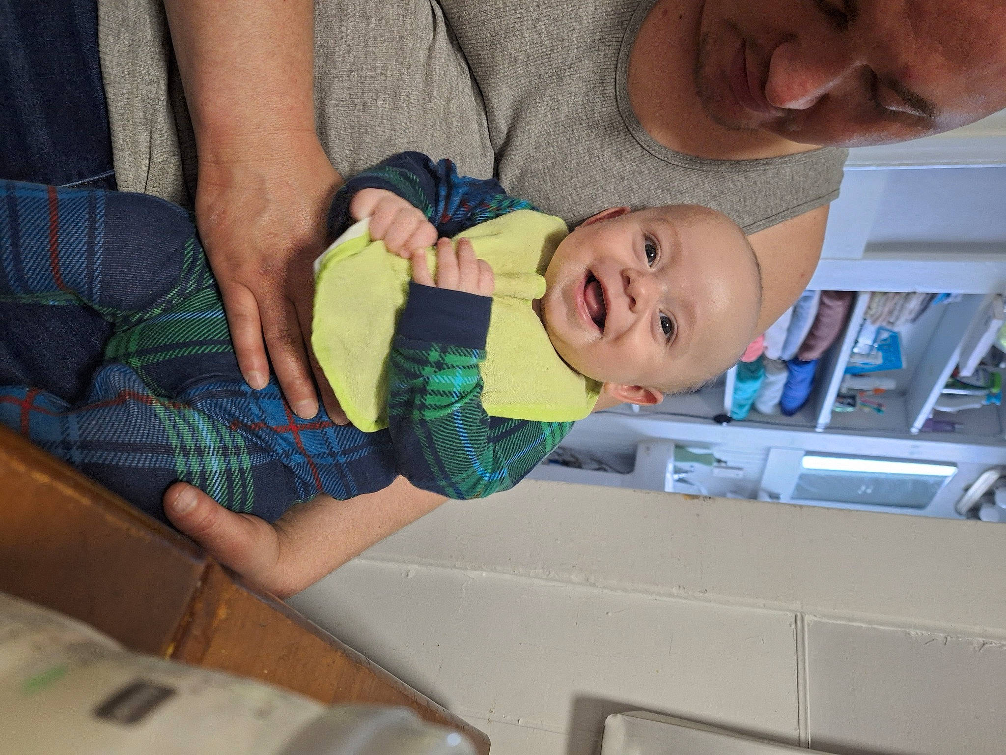 Wayne Jr joined the competition — help win amazing prizes! baby, baby_products, baby_toddler_clothing, child, comfort, fun, gesture, happy, leg, pattern, person, plaid, room, shelf, smile, sock, tartan, thigh, thumb, toddler