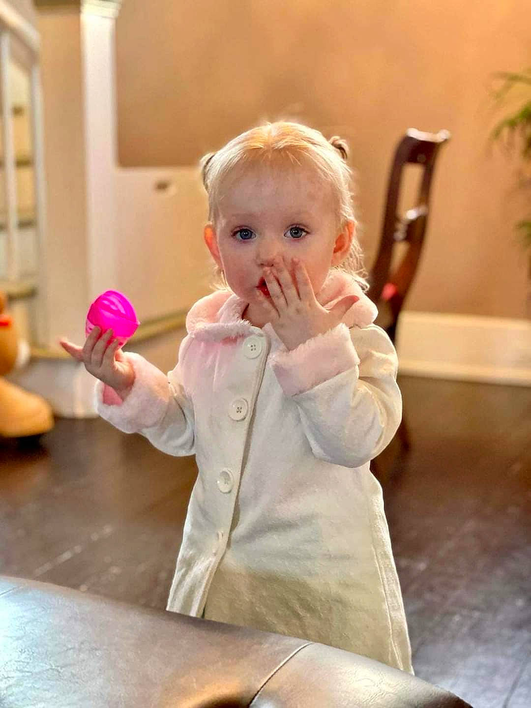 Gabriella is registered to the contest to win money with this photo: baby, baby_toddler_clothing, chair, cheek, child, floor, flooring, flowerpot, fun, gesture, happy, houseplant, person, plant, room, sitting, sleeve, table, toddler, vacation