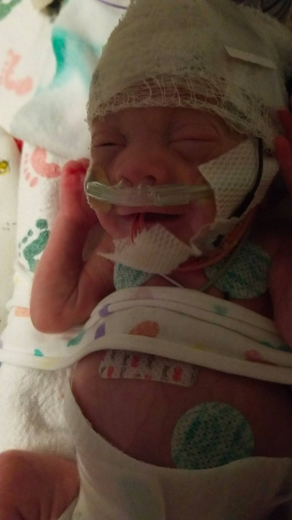 Raven is registered to the contest to win money with this photo: baby, beard, cap, cheek, chin, ear, eyelash, forehead, happy, head, headgear, headwear, jaw, lip, mouth, neck, nose, person, pink, skin