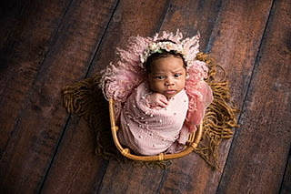 Maliah is registered to the contest to win money with this photo: baby, baby_products, chair, child, comfort, darkness, flash_photography, flooring, fun, fur, happy, person, portrait, portrait_photography, room, sitting, still_life_photography, toddler, vintage_clothing, wood