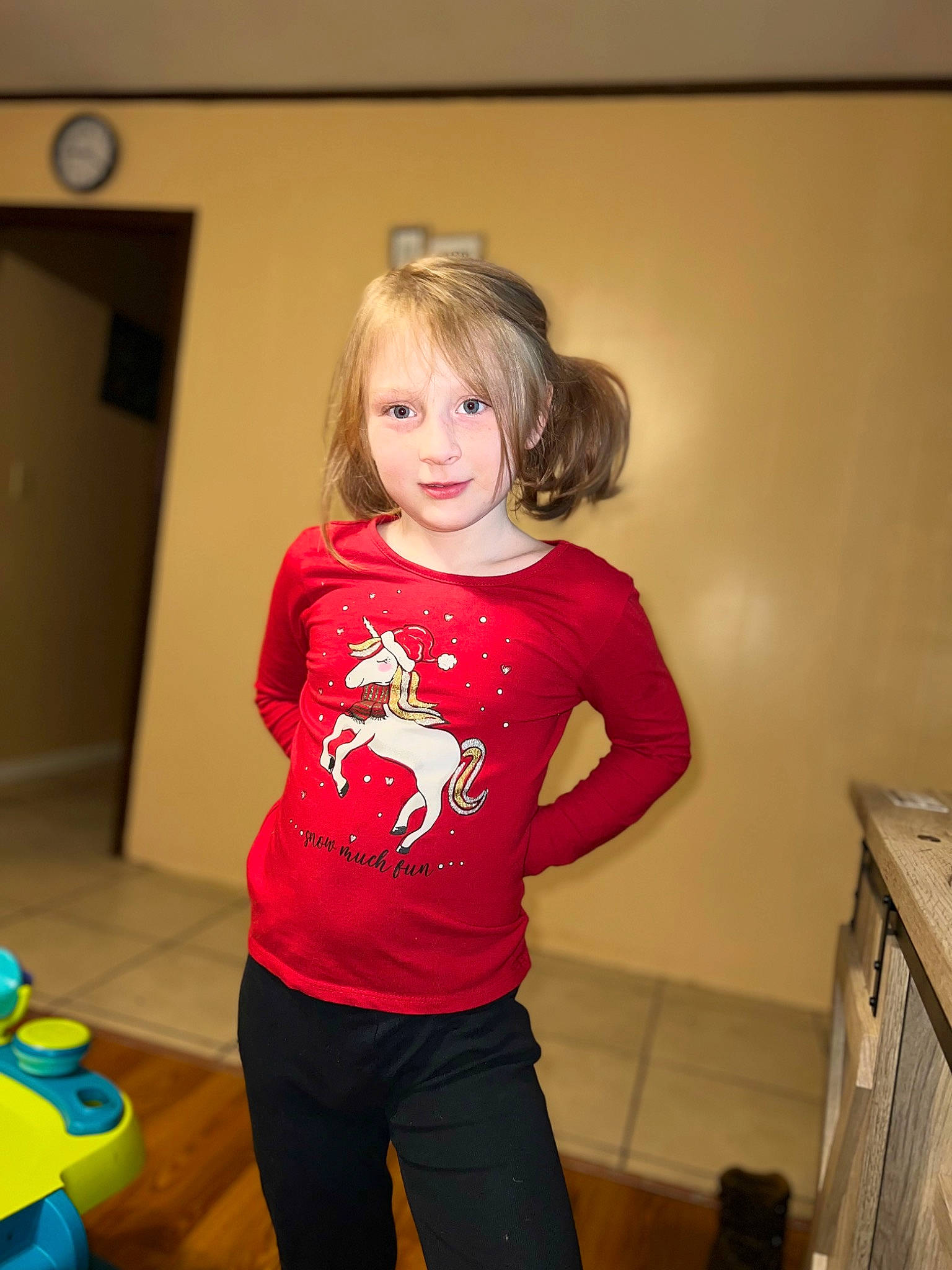 Adriana is registered to the contest to win money with this photo: abdomen, blond, chest, clock, elbow, floor, flooring, human_leg, joint, knee, long_hair, long_sleeved_t_shirt, person, shoulder, sleeve, sportswear, t_shirt, thigh, trunk, waist