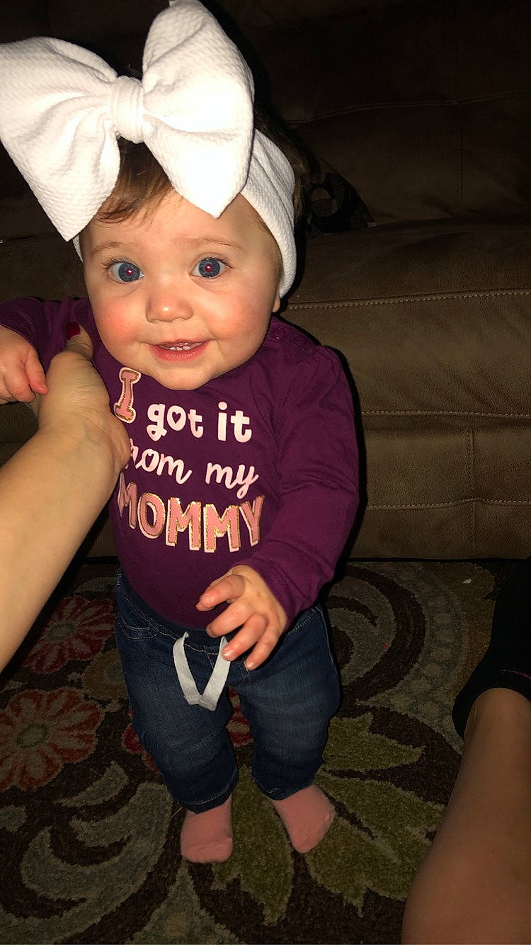 Harper joined the competition — help win amazing prizes! baby, baby_toddler_clothing, cap, cheek, cool, costume_hat, event, fashion_accessory, flash_photography, fun, happy, hat, headgear, headwear, magenta, person, sitting, sleeve, smile, t_shirt