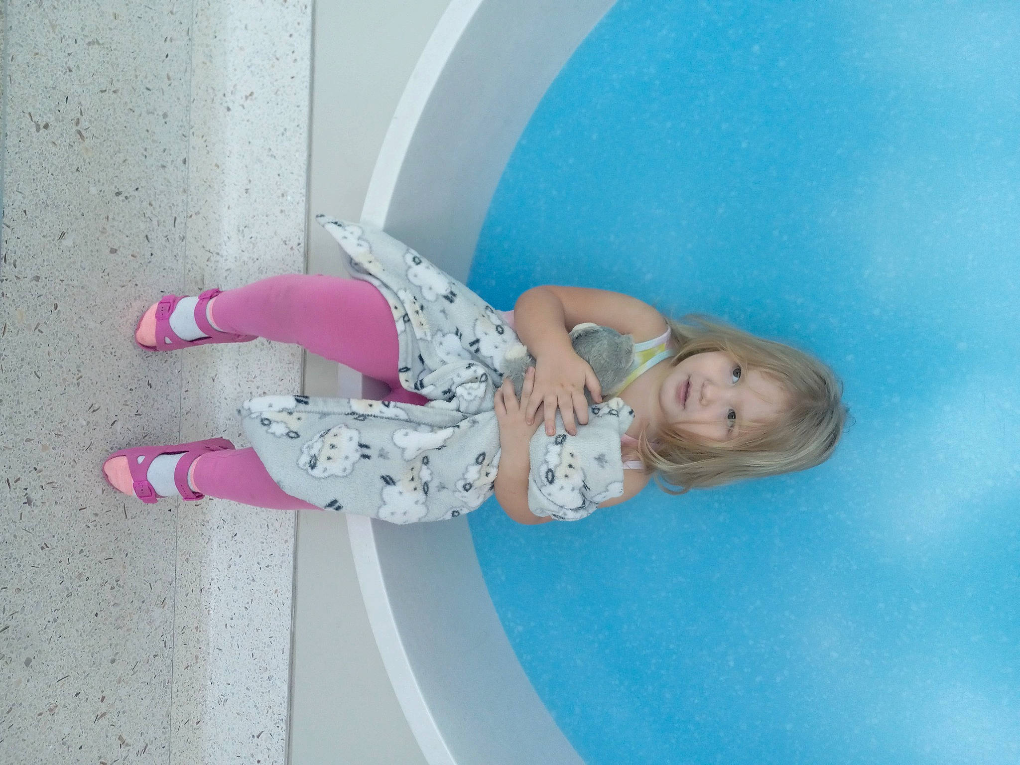 Laela joined the competition — help win amazing prizes! baby_toddler_clothing, blue, comfort, elbow, electric_blue, floor, flooring, fun, human_leg, knee, leg, leisure, magenta, person, pink, purple, shoe, sitting, sneakers, thigh